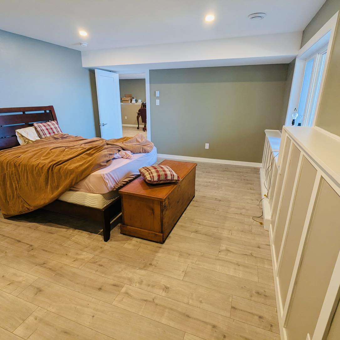 Modern bedroom renovation with updated finishes and contemporary design